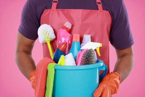 Cleaner preparing equipment for safe carpet cleaning in Stoke Newington